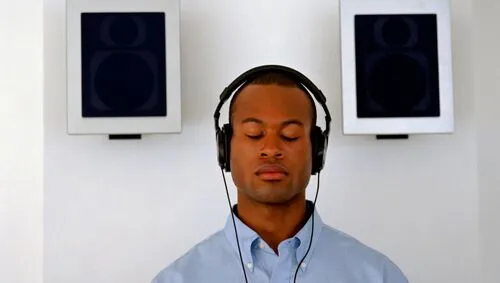 man with headphones undergoing sound therapy man with headphones undergoing sound therapy